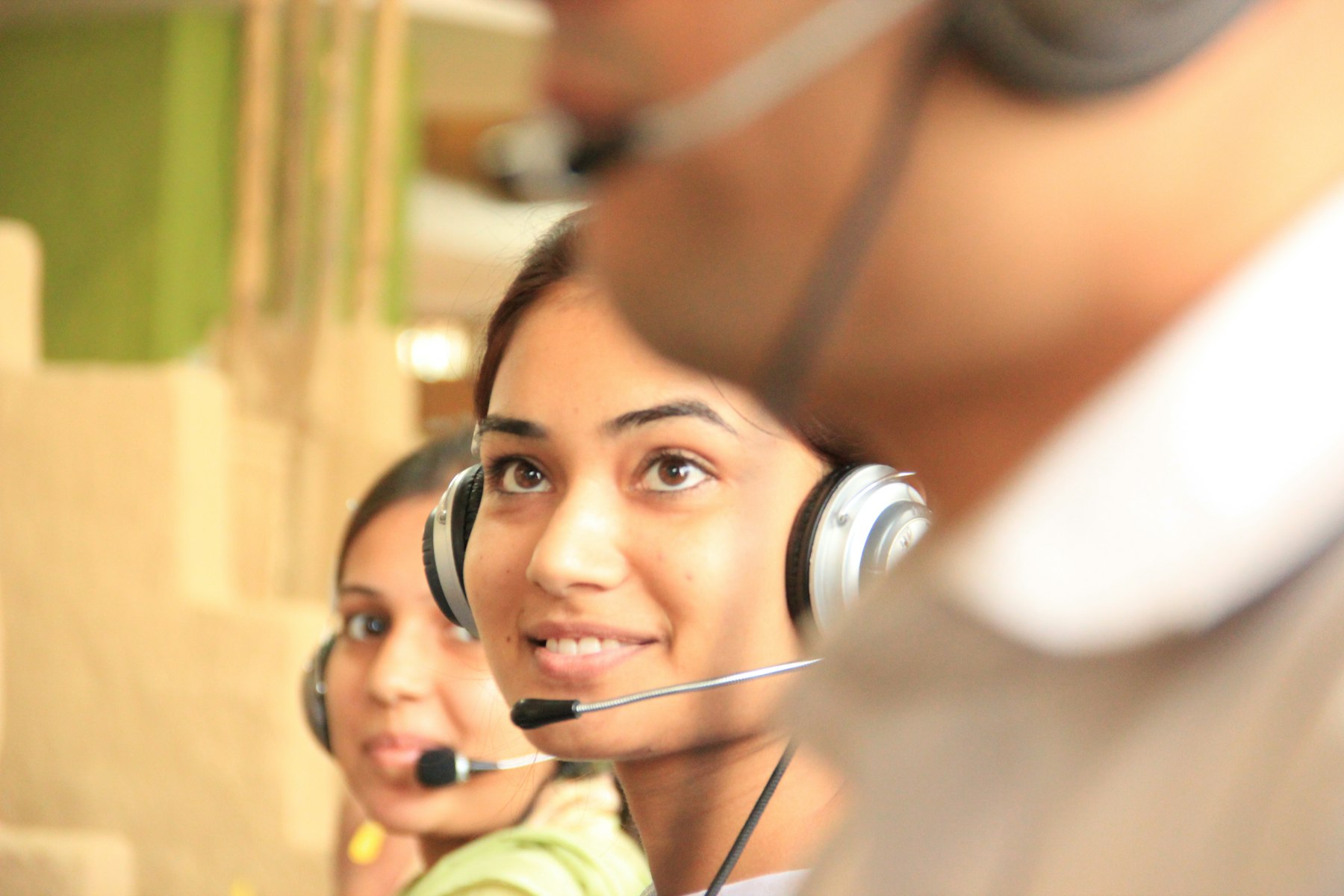 Customer support team assisting a call